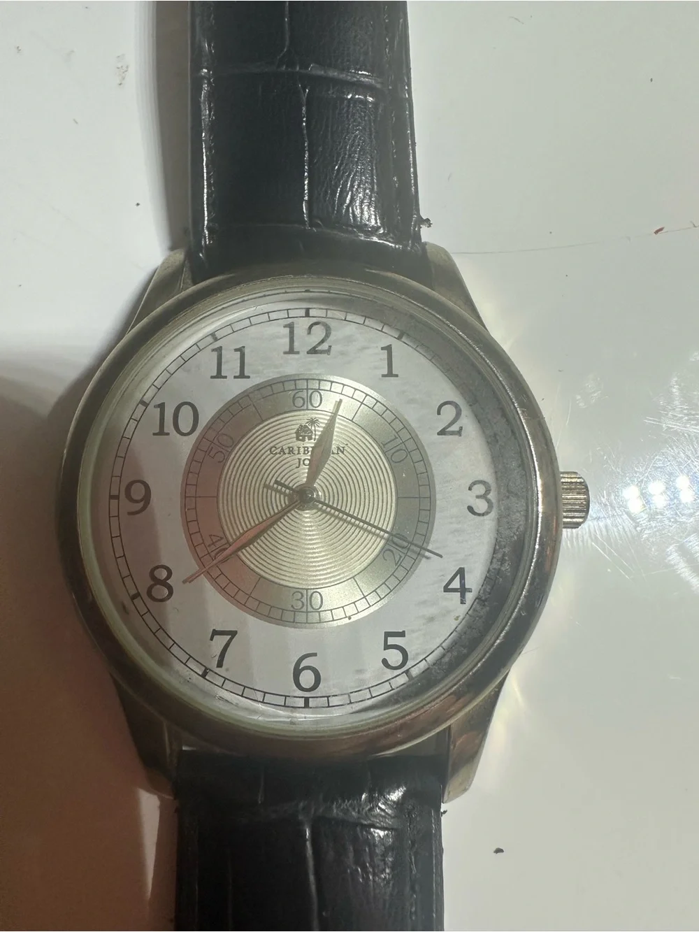 Caribbean Joe Gold and Black Wall Clock
